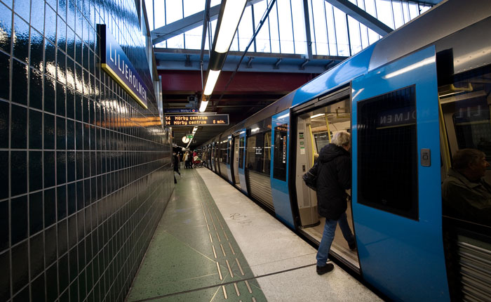 person getting on a train