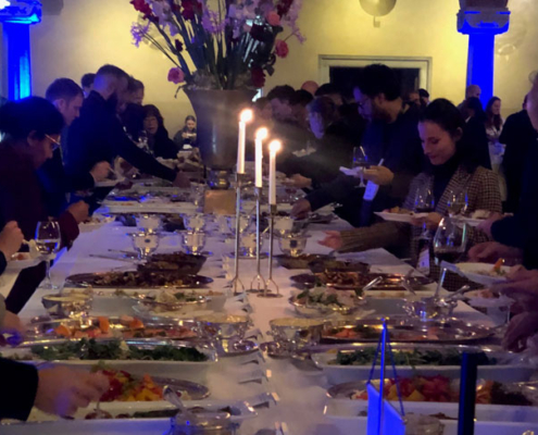 people eating at an event dinner